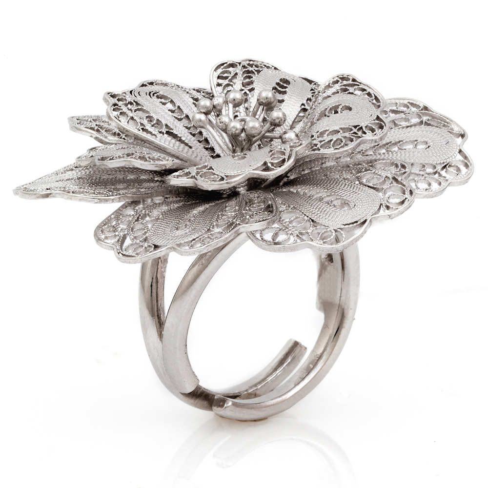 silver flower shaped diamond ring